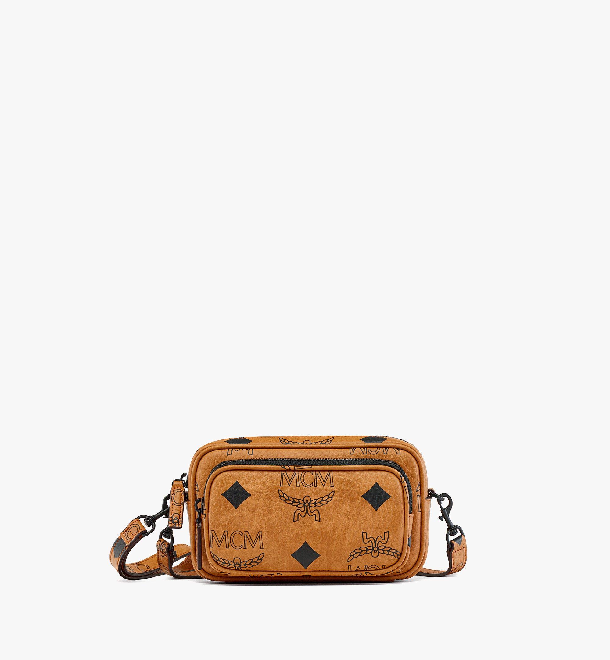 Mcm bag with on sale pouch